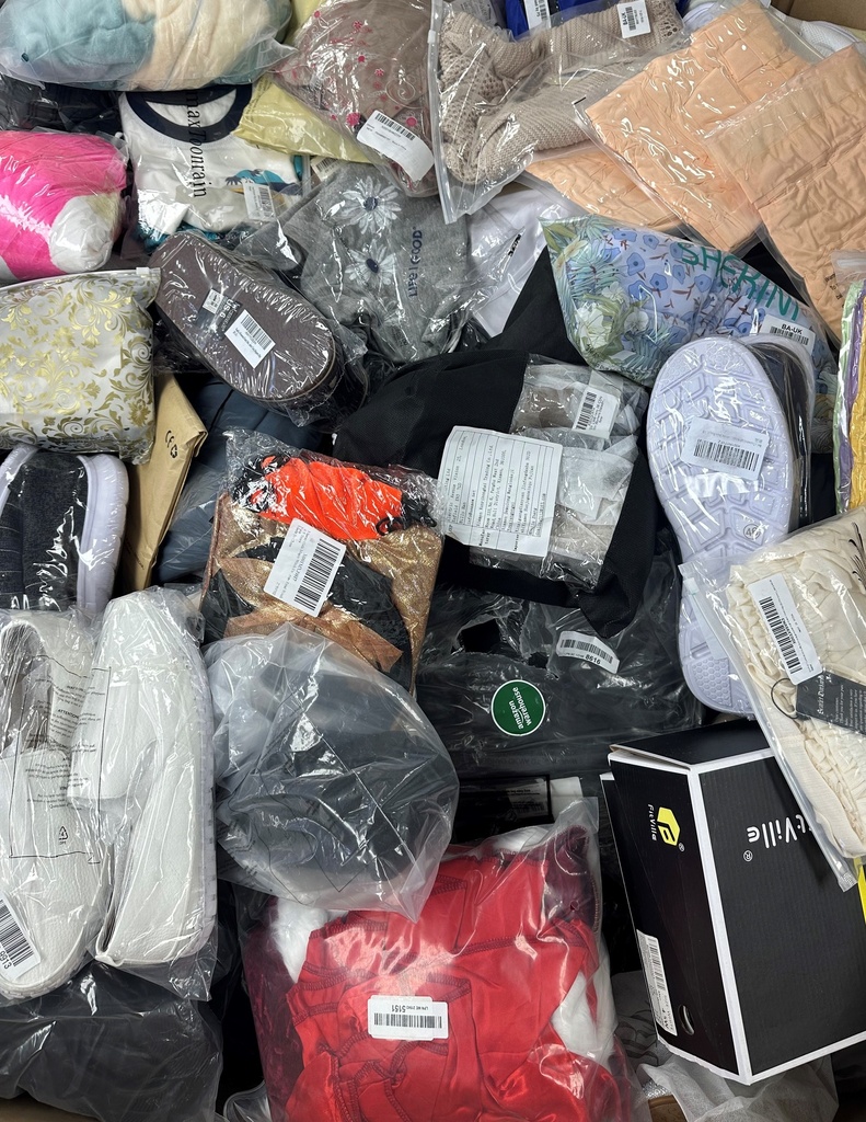 Pallet of Assorted Shoes & Clothing - RRP £7,317 - 249 Items!